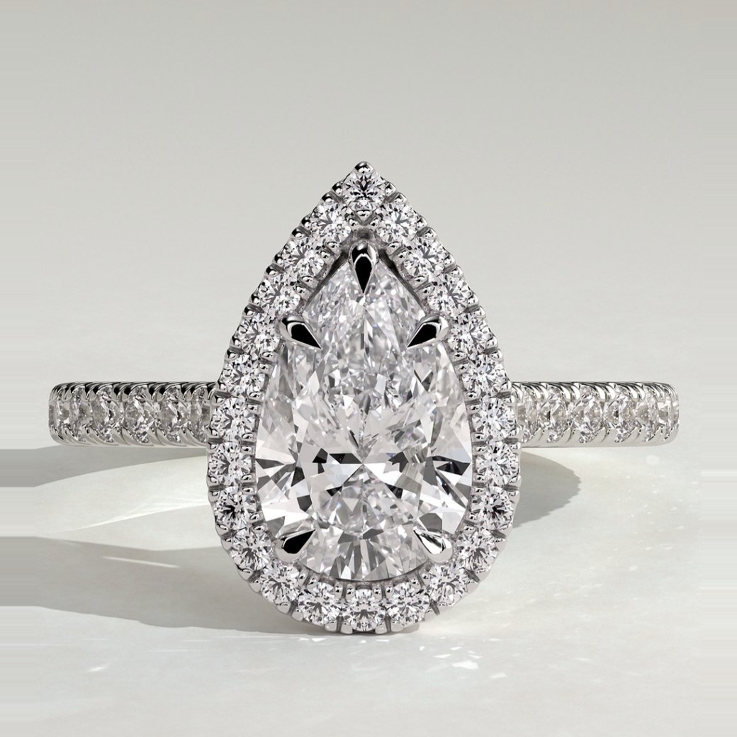 Pear cathedral halo ring by SHER.